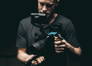 man holding camera